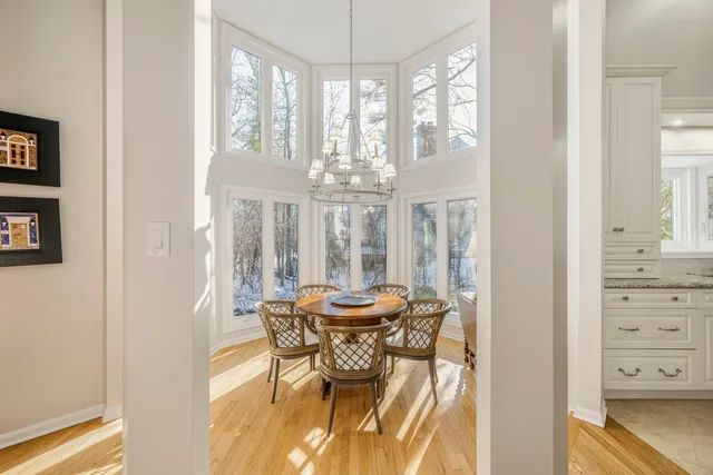 a bed room with a bed and a night stand