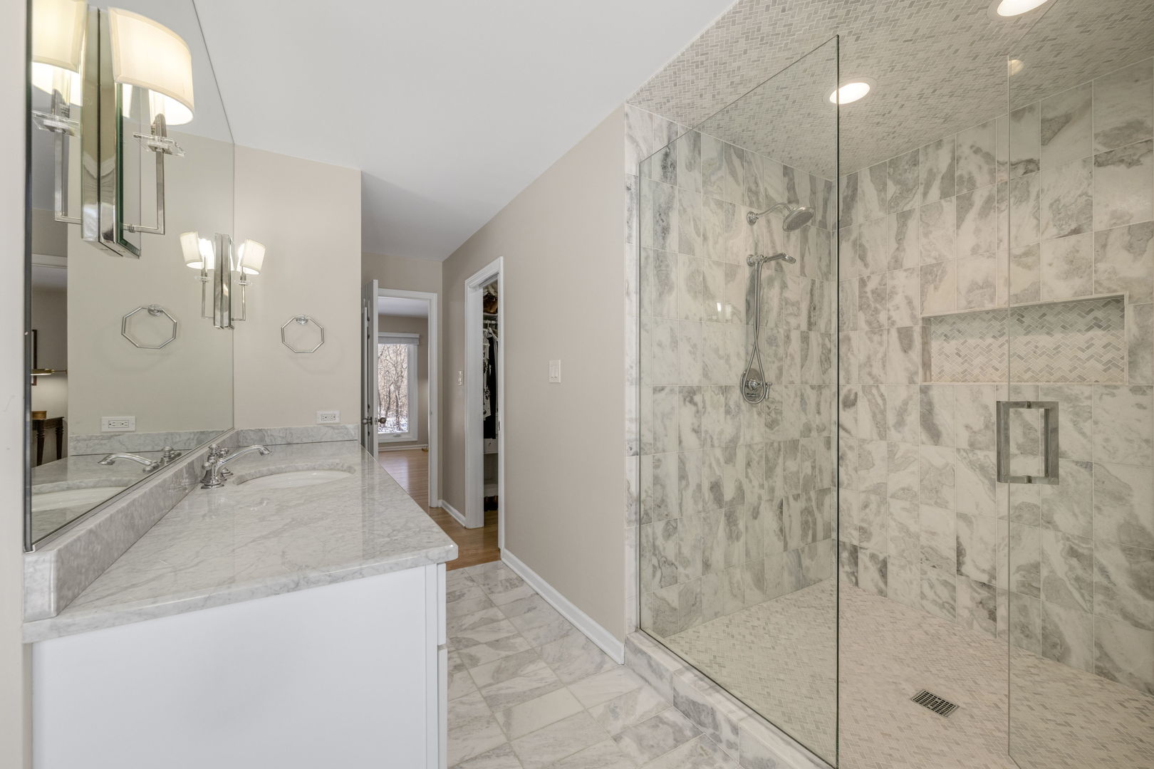 175 Margate Court Lake Bluff, IL 60044 - Photo 19 of 57 a bathroom with a granite countertop sink a mirror and shower