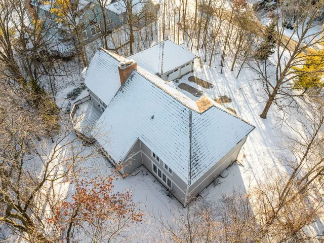 a picture of a room with a white wall and a picture of a painting