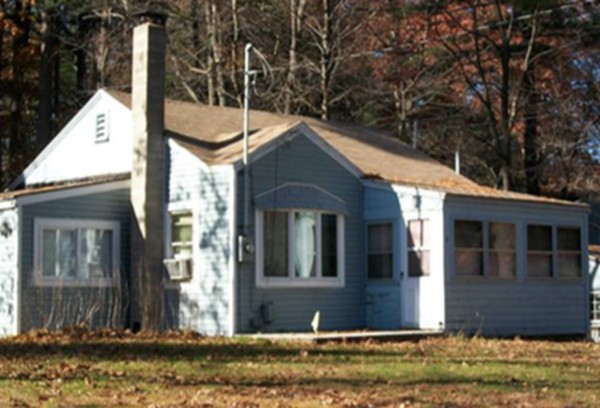 8 Craig Road Holland, MA 01521 - Photo 1 of 24 a front view of a house with yard