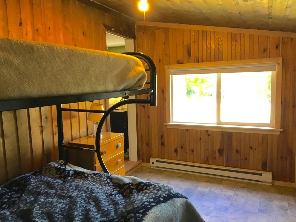 8 Craig Road Holland, MA 01521 - Photo 12 of 24 a bedroom with a bed and a window