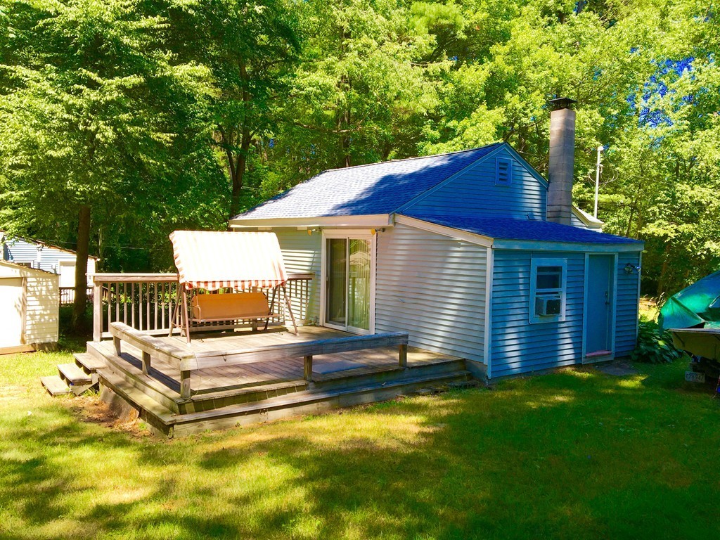 8 Craig Road Holland, MA 01521 - Photo 16 of 24 a view of a house with a yard