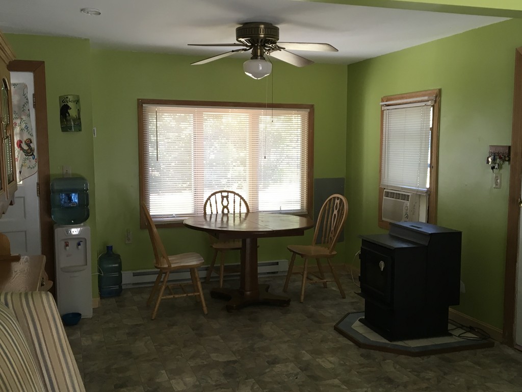 8 Craig Road Holland, MA 01521 - Photo 20 of 24 a dining room with furniture and chandelier