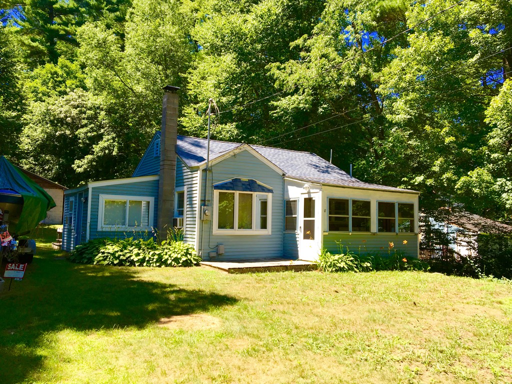 8 Craig Road Holland, MA 01521 - Photo 2 of 24 a front view of a house with a yard