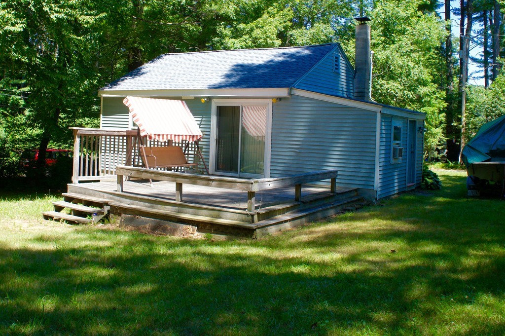 8 Craig Road Holland, MA 01521 - Photo 23 of 24 a view of a small house in the back yard of a house