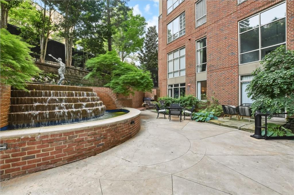 2626 Peachtree Road Northwest, Unit 606 Atlanta, GA 30305 - Photo 27 of 27 a view of house with outdoor space