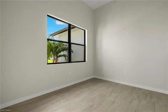 an empty room with window