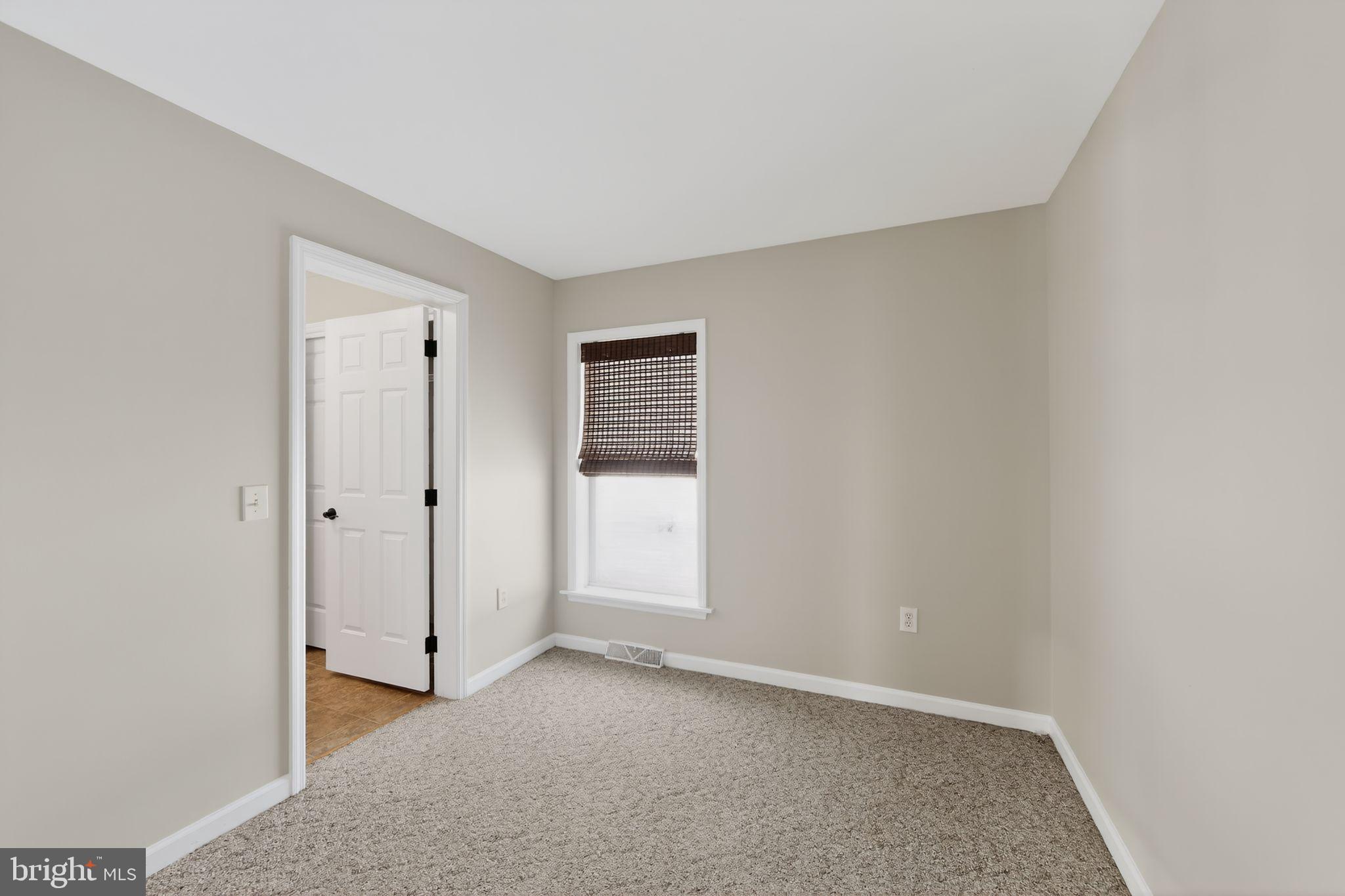 3211 Coventryville Road Pottstown, PA 19465 - Photo 17 of 37 a view of an empty room and window