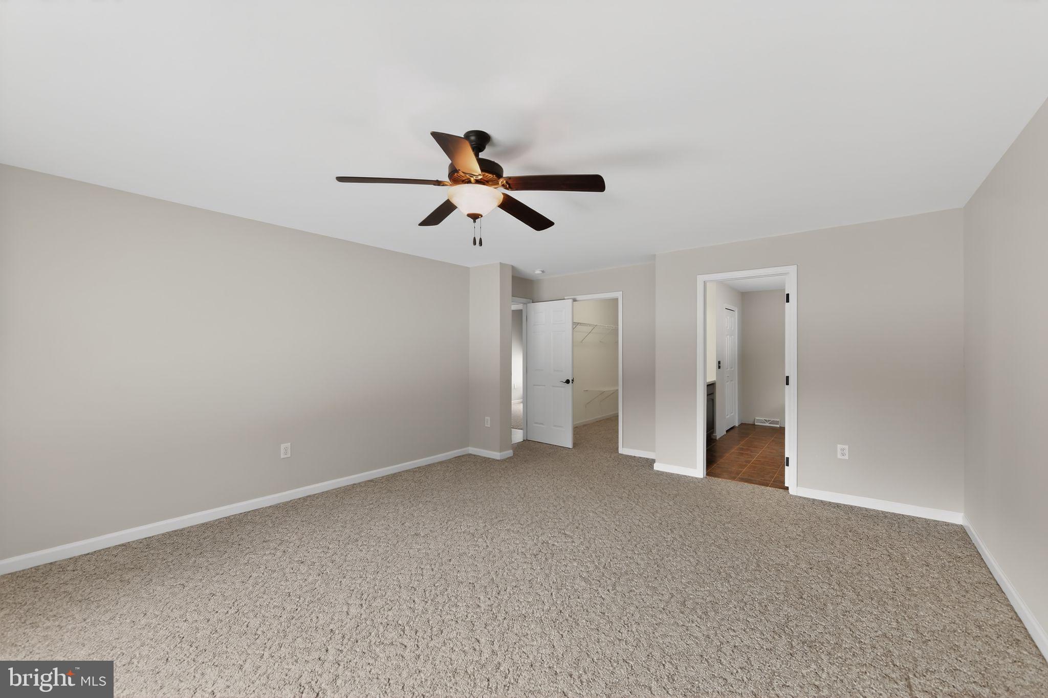 3211 Coventryville Road Pottstown, PA 19465 - Photo 21 of 37 a view of a livingroom with a ceiling fan and window