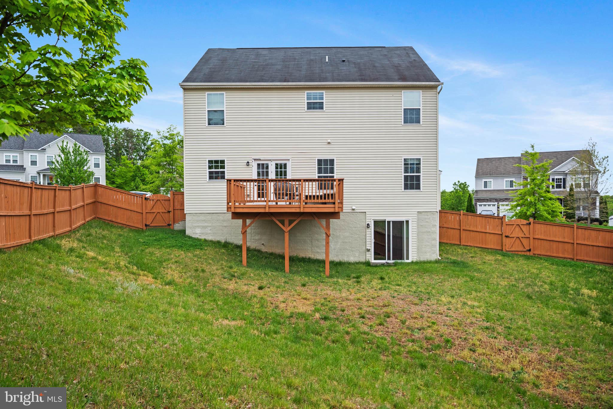 3214 Fledgling Circle Woodbridge, VA 22193 - Photo 2 of 29 Spacious backyard with deck retreat.