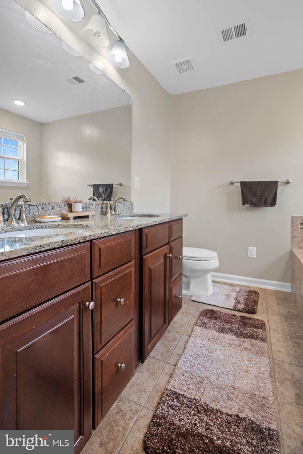 3214 Fledgling Circle Woodbridge, VA 22193 - Photo 26 of 29 Modern bathroom with elegant finishes.