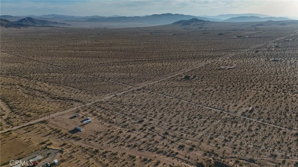 747 Joshua Tree Road Johnson Valley, CA 92285 - Photo 4 of 6 a view of a dry yard