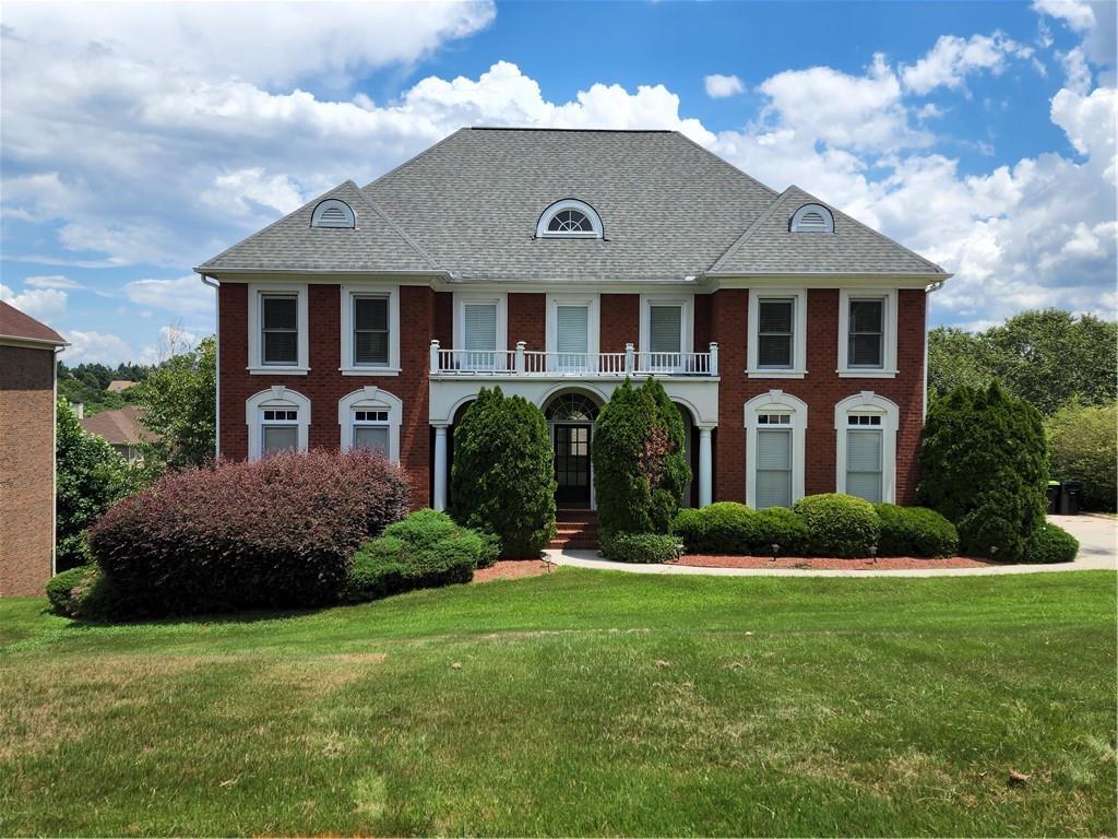 5195 Stone Croft Trail Atlanta, GA 30331 - Photo 1 of 1 a front view of a house with a garden