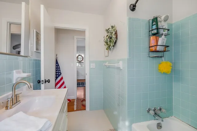 a vase of flowers sitting on a table