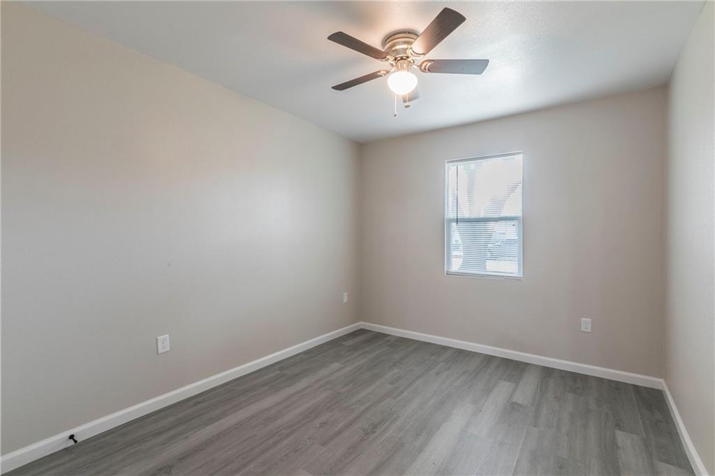 613 North Rita Street Waco, TX 76705 - Photo 13 of 17 an empty room with a window and a fan
