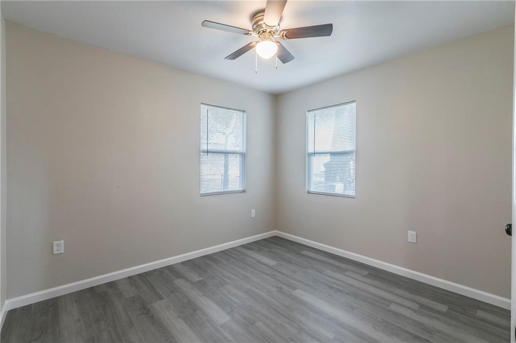 613 North Rita Street Waco, TX 76705 - Photo 10 of 17 an empty room with a window and a fan