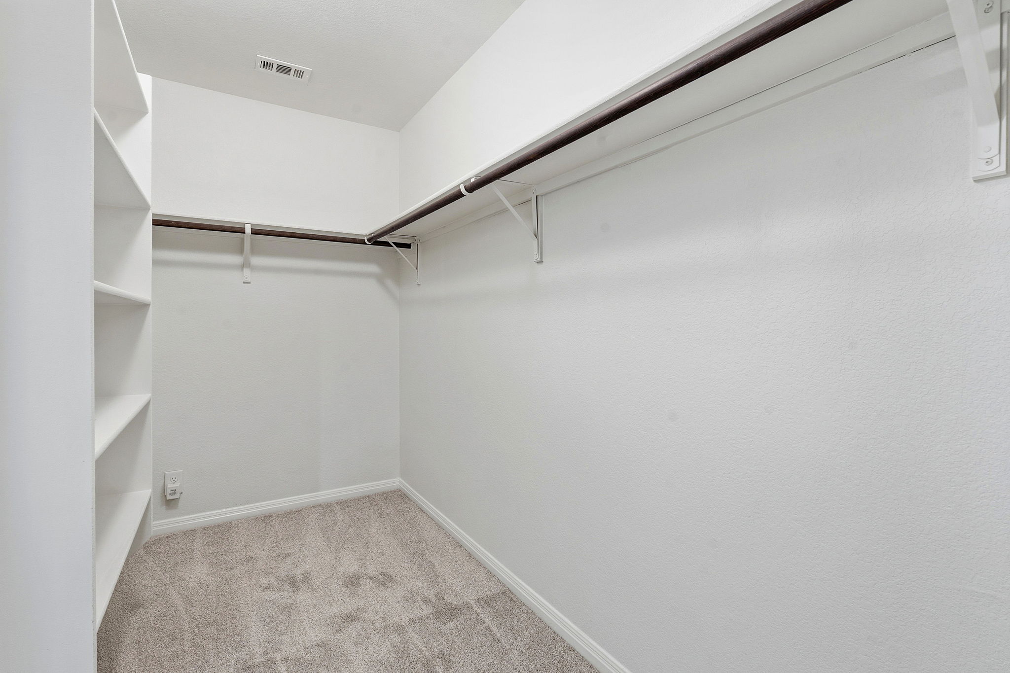 8541 Inca Dove Drive Austin, TX 78729 - Photo 19 of 28 The spacious walk-in closet.