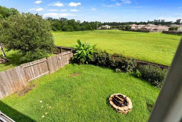 a view of a lake with a big yard