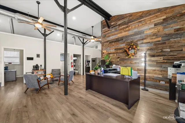 a living room with lots of furniture and a window