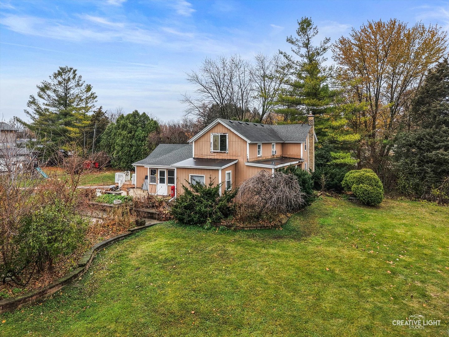 3711 West Algonquin Road Algonquin, IL 60102 - Photo 5 of 21 a view of a house with a yard