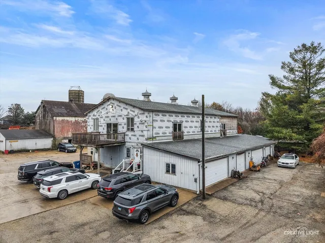 a view of a cars park in front of house