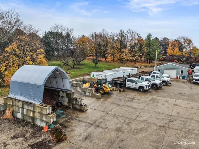 a view of a parked cars in front of house