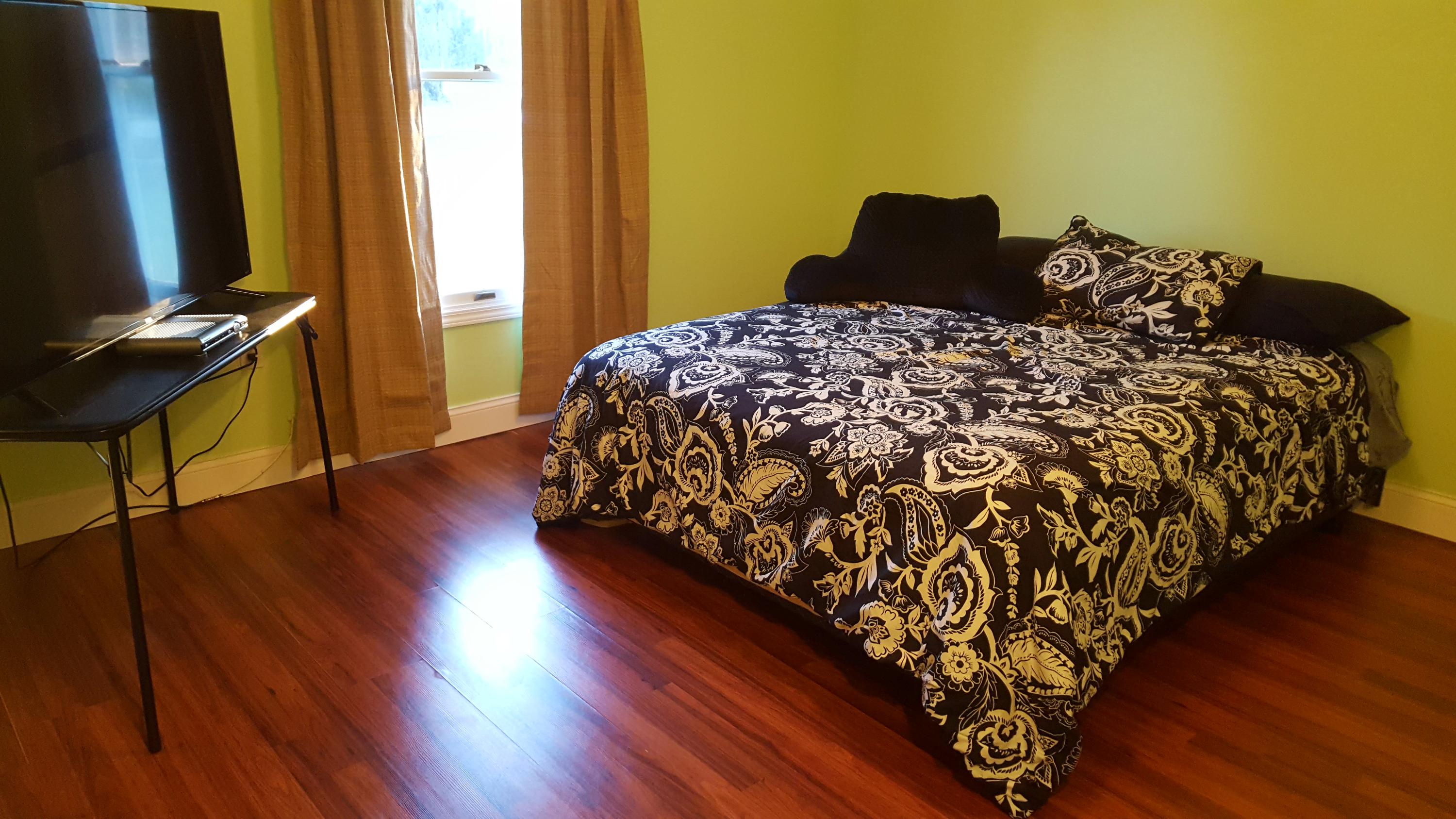 17999 41st Road North Loxahatchee, FL 33470 - Photo 14 of 19 a bed sitting in a bedroom next to a window
