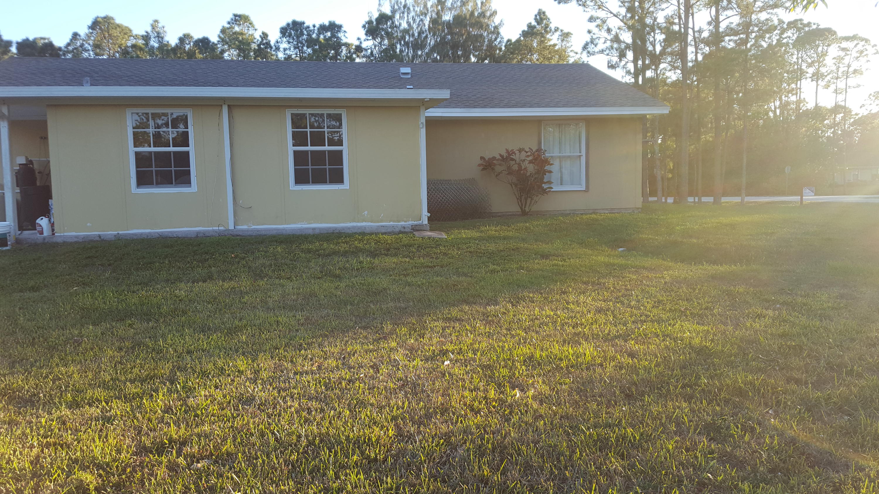 17999 41st Road North Loxahatchee, FL 33470 - Photo 3 of 19 front view of a house with a yard