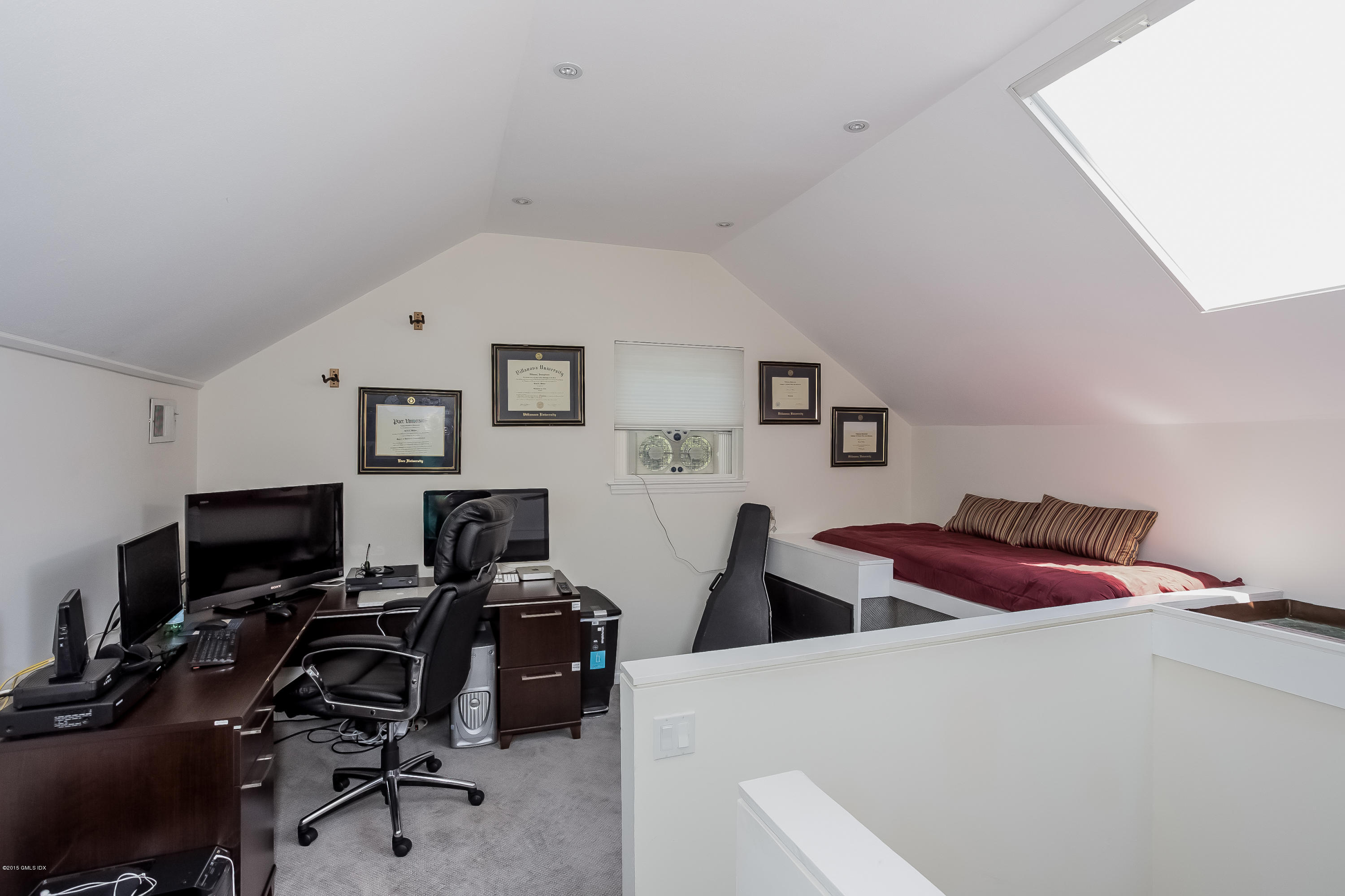 100 Strickland Road, Unit 9 Cos Cob, CT 06807 - Photo 10 of 21 a bedroom with furniture and a air conditioner