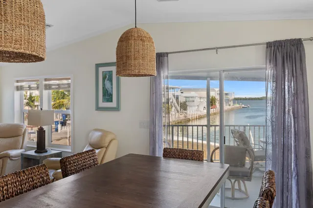 a kitchen with a refrigerator sink and stove