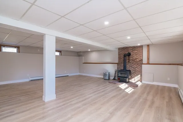 a view of a backyard with sitting area