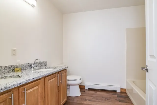 a picture of a bathroom with a shower