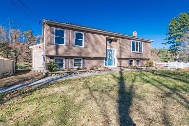 a view of a house with a swimming pool