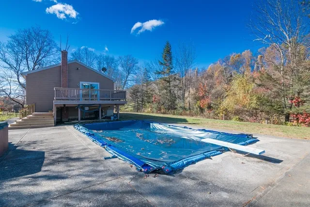 a kitchen with stainless steel appliances a refrigerator stove microwave and sink