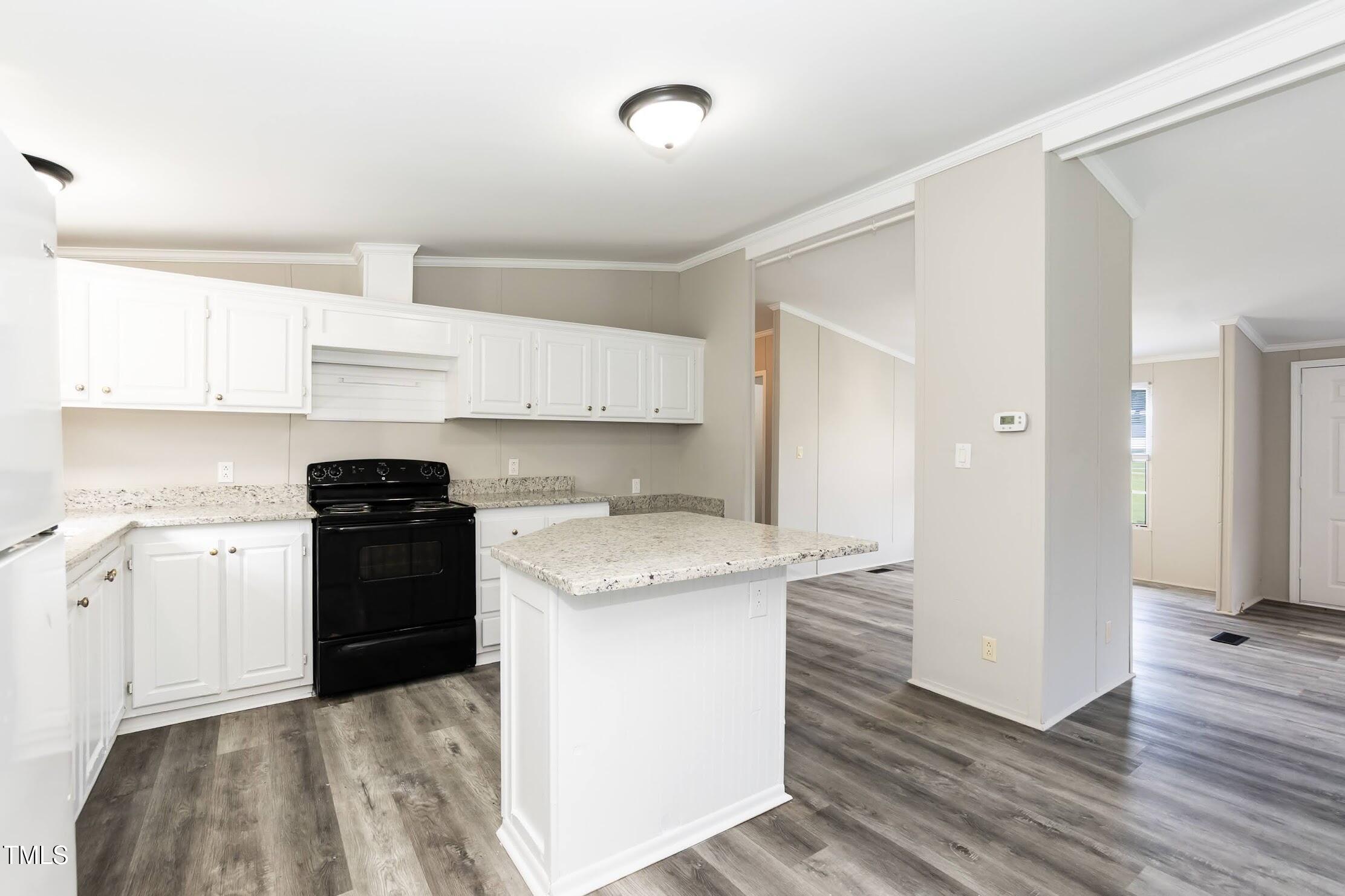 40 Beaver Run Road Spring Hope, NC 27882 - Photo 14 of 28 a kitchen with stainless steel appliances granite countertop a sink stove and refrigerator