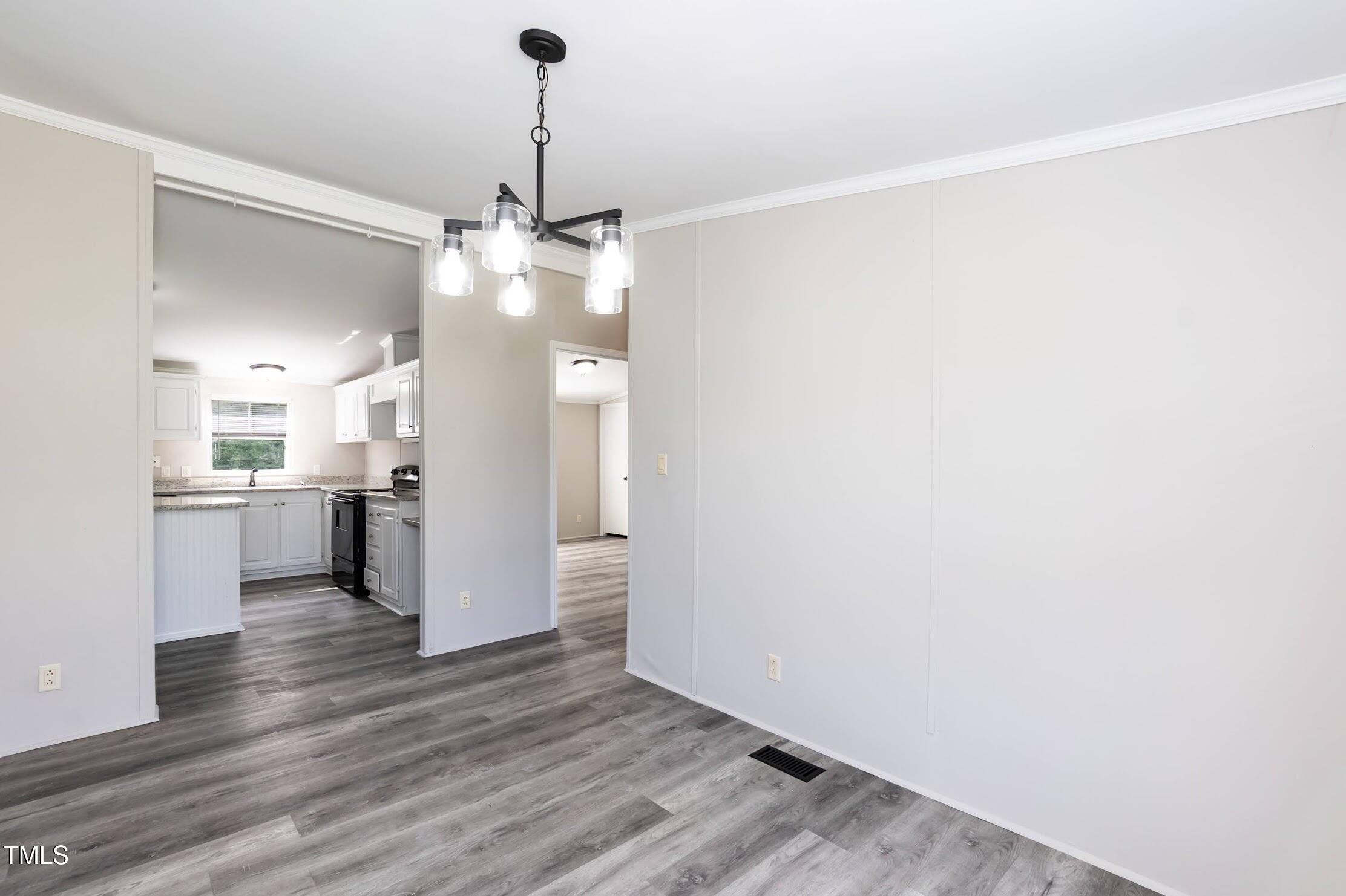 40 Beaver Run Road Spring Hope, NC 27882 - Photo 20 of 28 a view of a kitchen with a sink and refrigerator