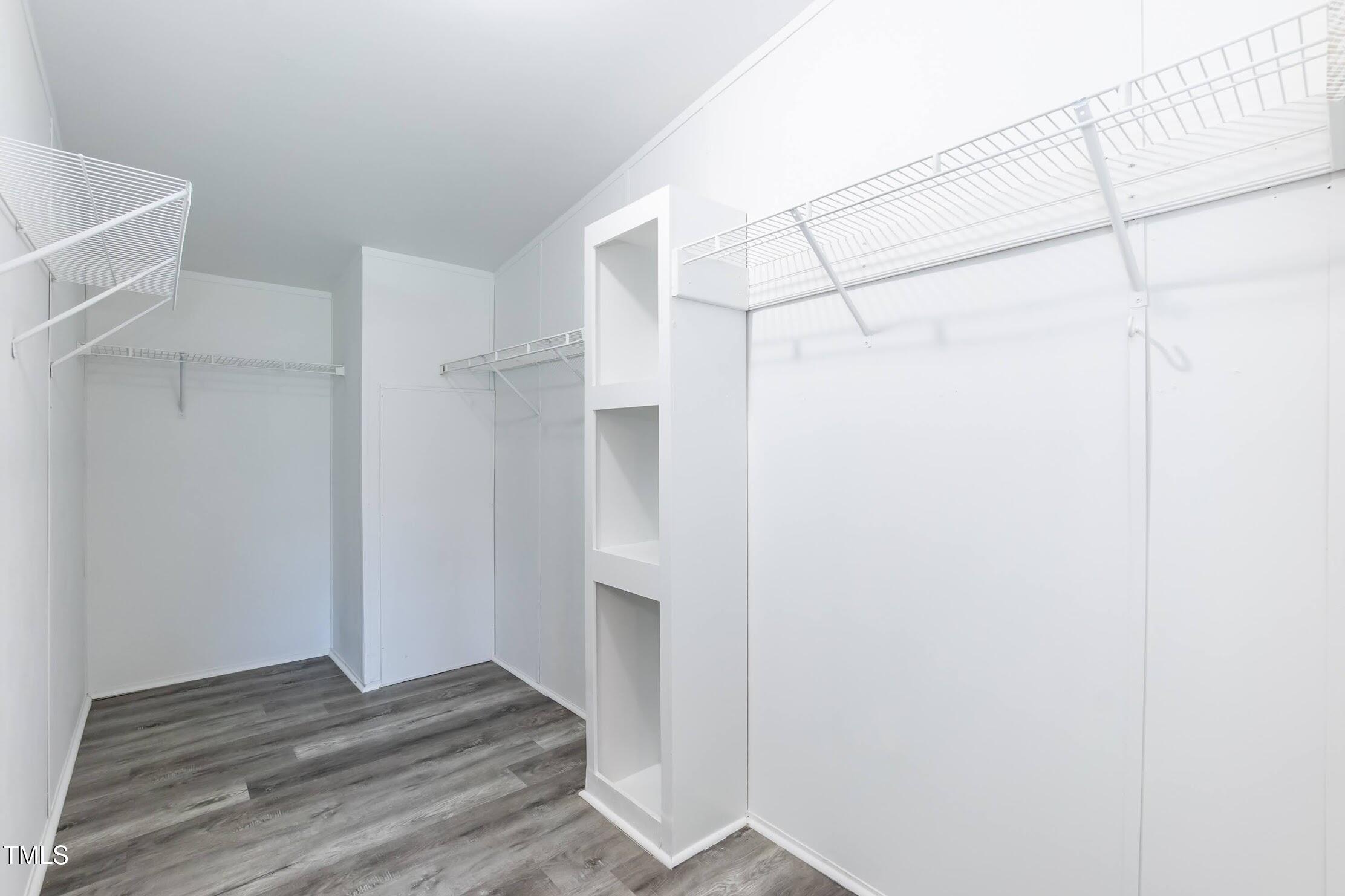 40 Beaver Run Road Spring Hope, NC 27882 - Photo 23 of 28 a view of walk in closet with empty racks