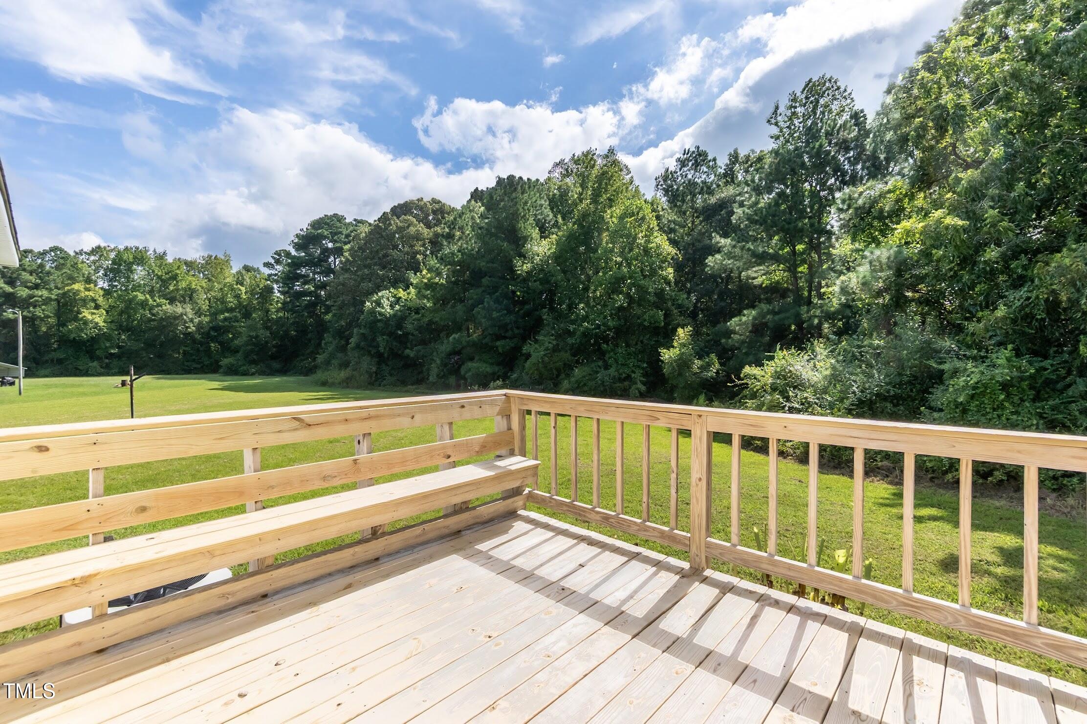 40 Beaver Run Road Spring Hope, NC 27882 - Photo 8 of 28 a view of balcony with wooden floor and fence