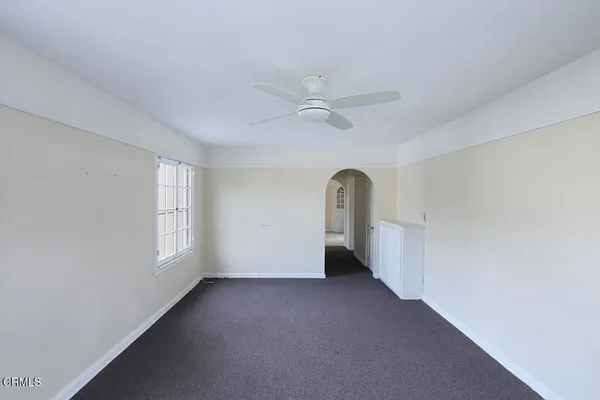 an empty room with windows