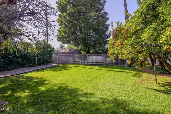 a backyard of a house with lots of green space