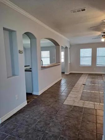 an empty room with windows