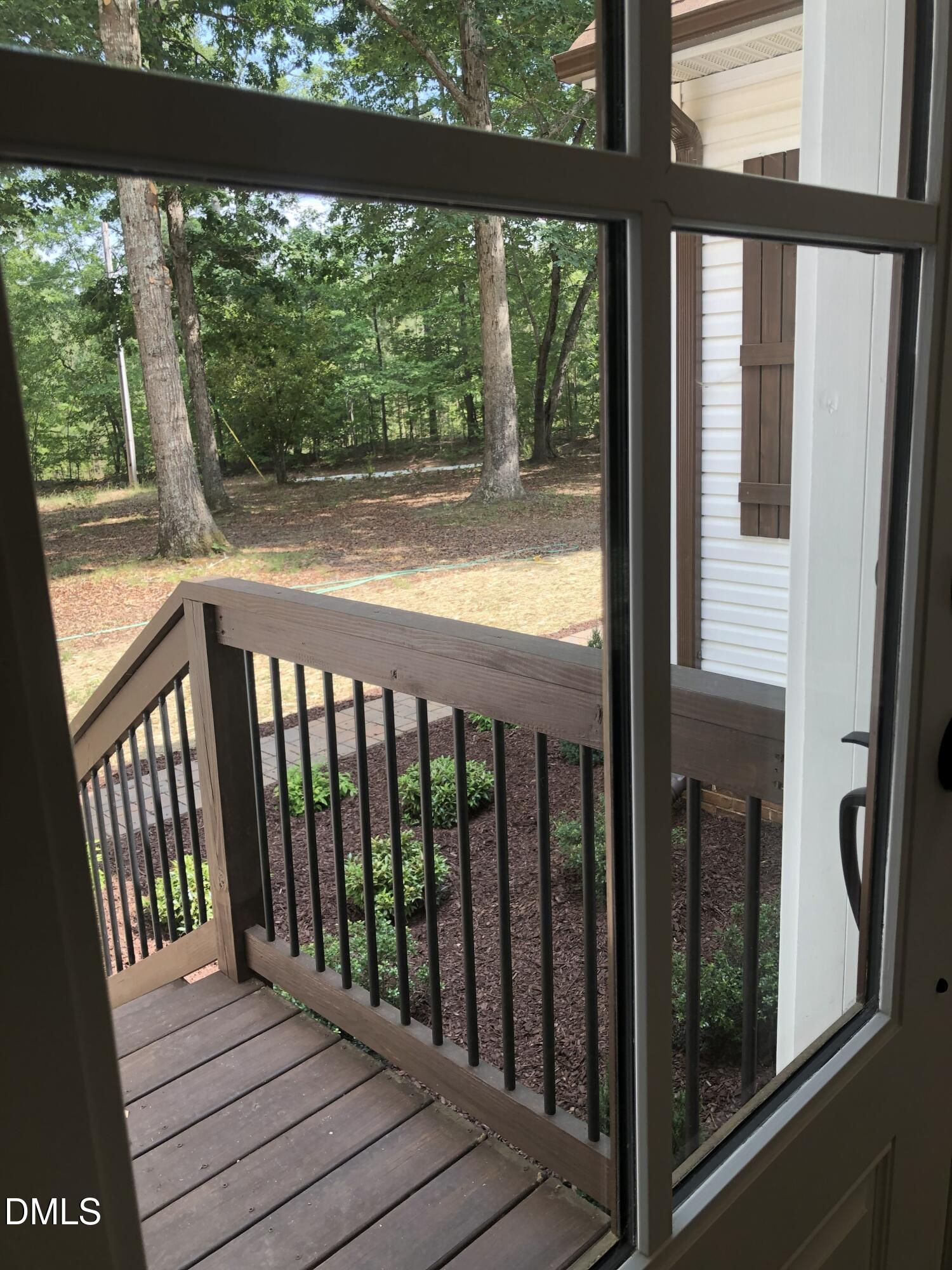 95 Smith Taylor Trail Roxboro, NC 27574 - Photo 23 of 47 a view of a wooden balcony with wooden floor