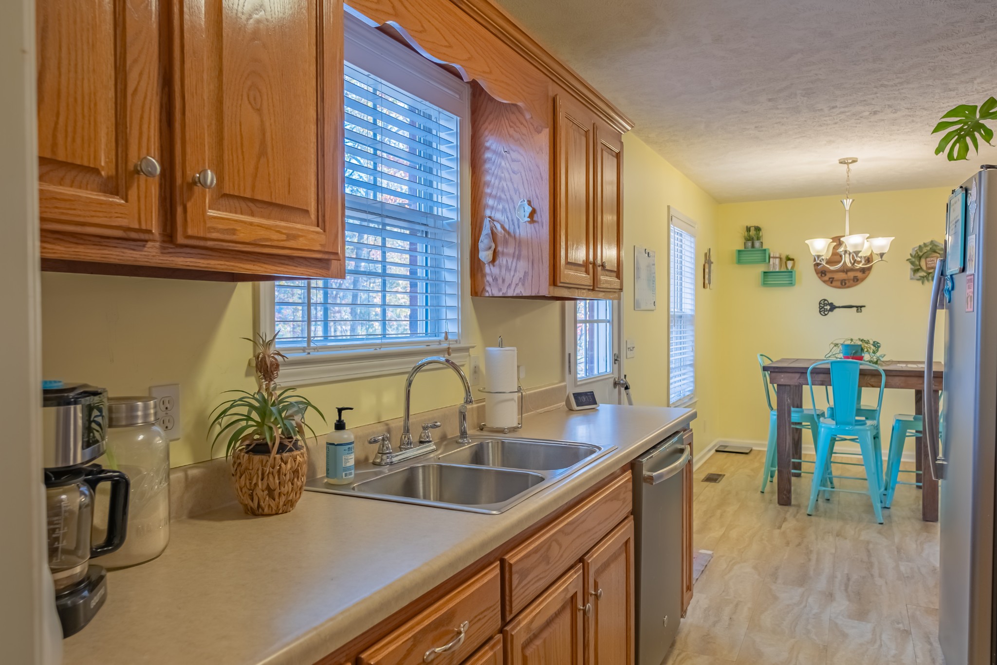 353 Oak Hollow Road Manchester, TN 37355 - Photo 14 of 32 a kitchen with a sink and a refrigerator