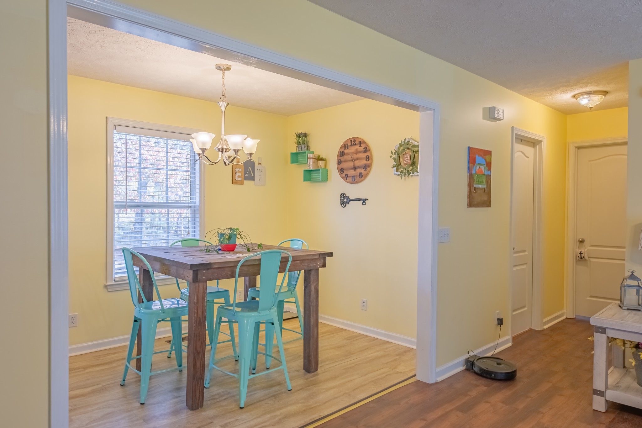 353 Oak Hollow Road Manchester, TN 37355 - Photo 15 of 32 a view of a dining room with furniture window and wooden floor