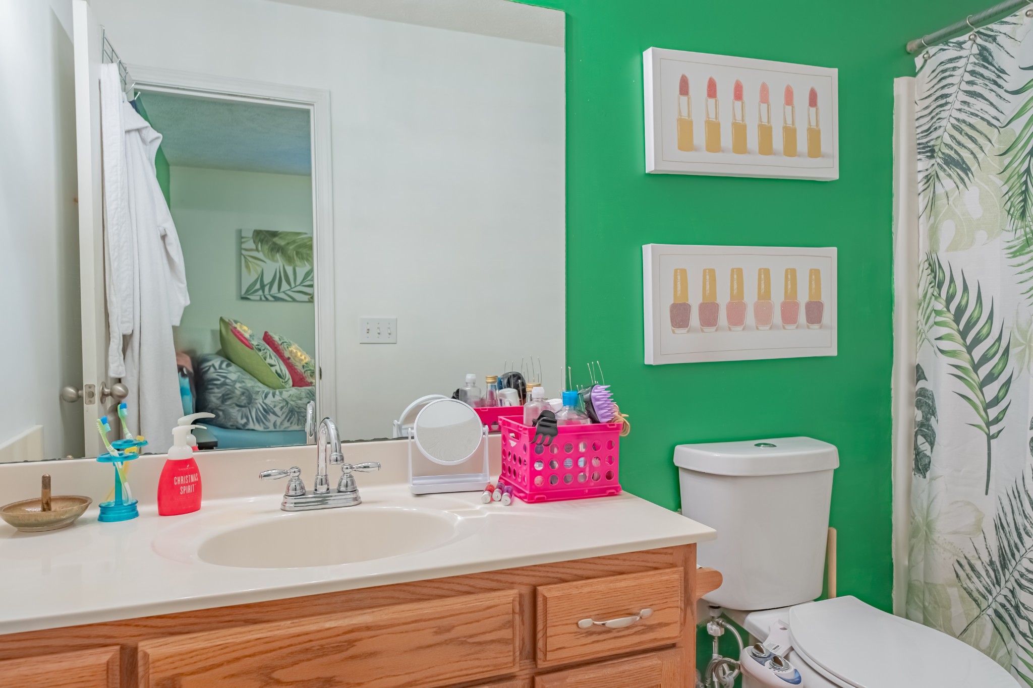 353 Oak Hollow Road Manchester, TN 37355 - Photo 22 of 32 a bathroom with a sink vanity mirror and toilet
