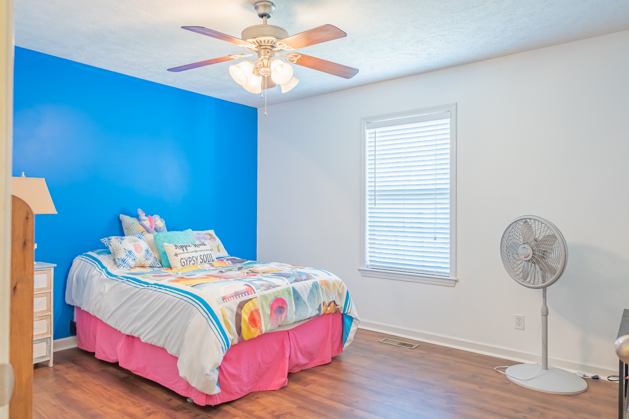 353 Oak Hollow Road Manchester, TN 37355 - Photo 23 of 32 a bedroom with a bed and a chandelier