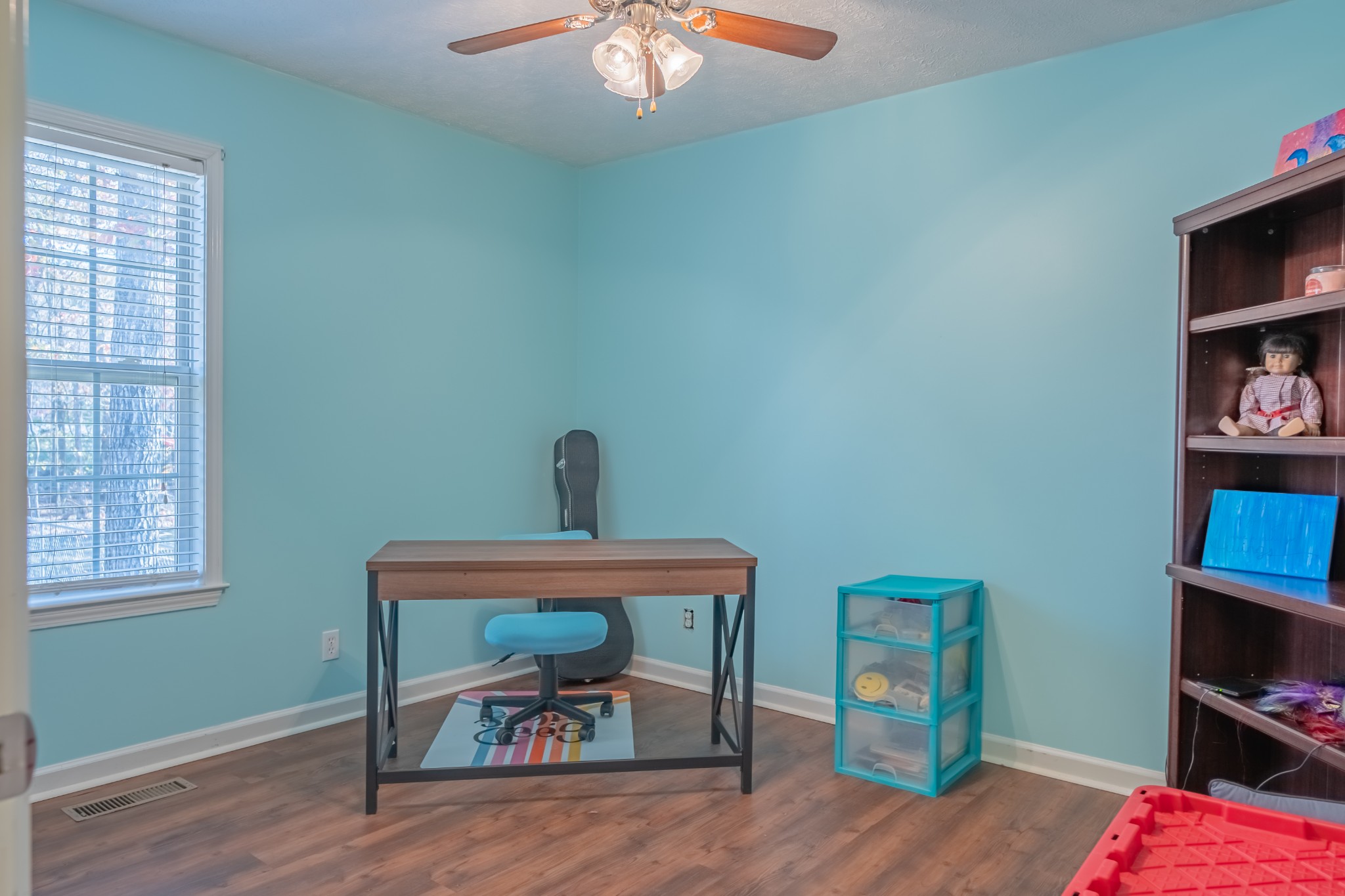 353 Oak Hollow Road Manchester, TN 37355 - Photo 26 of 32 a view of room with workspace and wooden floor