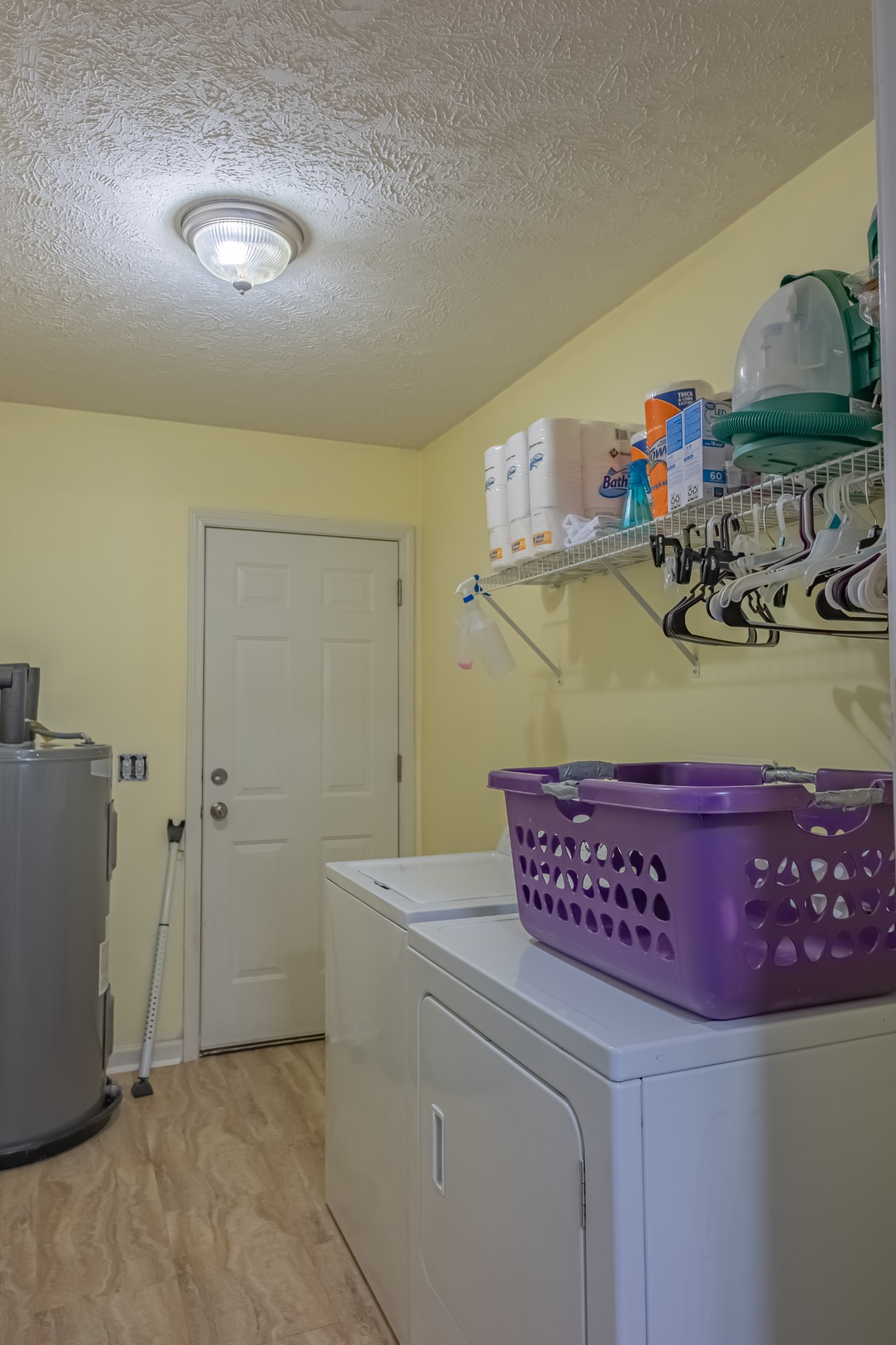 353 Oak Hollow Road Manchester, TN 37355 - Photo 32 of 32 a room with storage and utility