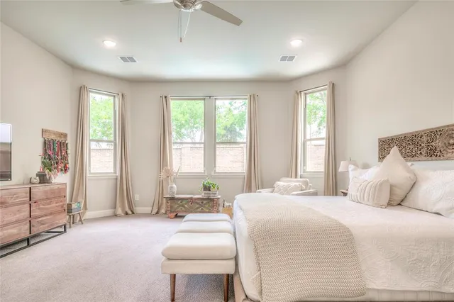 a bathroom with a granite countertop sink mirror and vanity