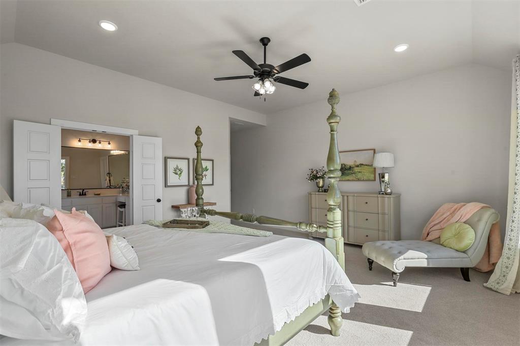 147 Rj Smith Drive Boyd, TX 76023 - Photo 11 of 15 a bedroom with a bed couch and a window